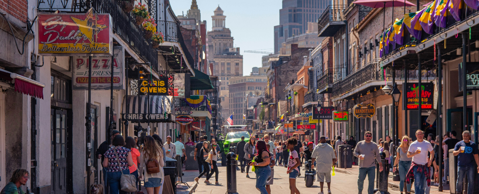 People walking along Bourbon Street, New Orleans