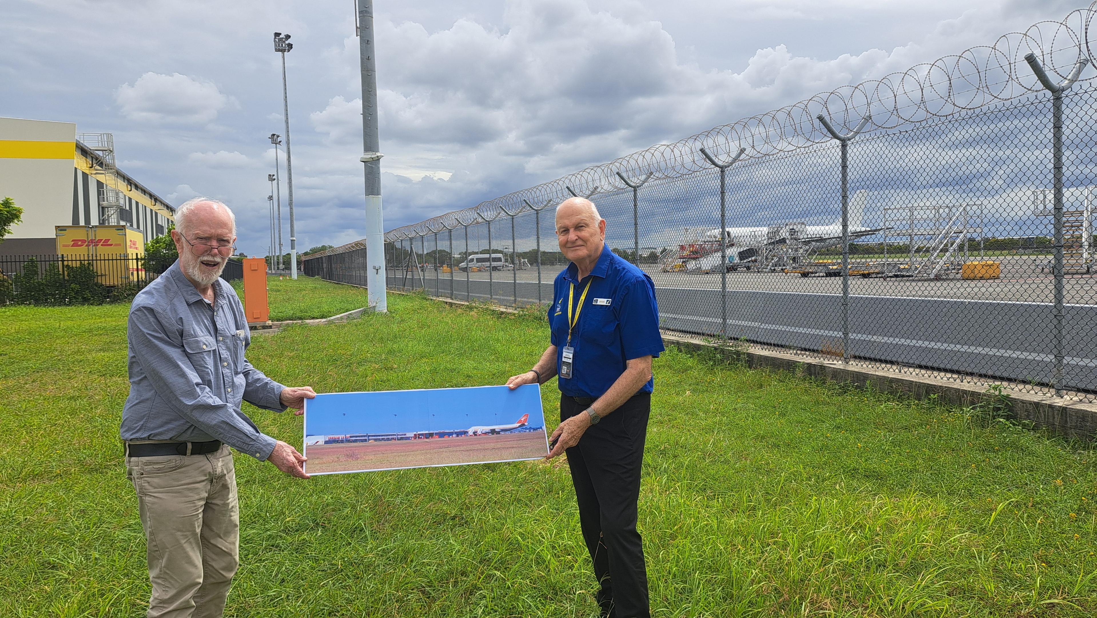 Don and Gavan near the site of the Interim International Terminal. Don and Gavan near the site of the Interim International Terminal.